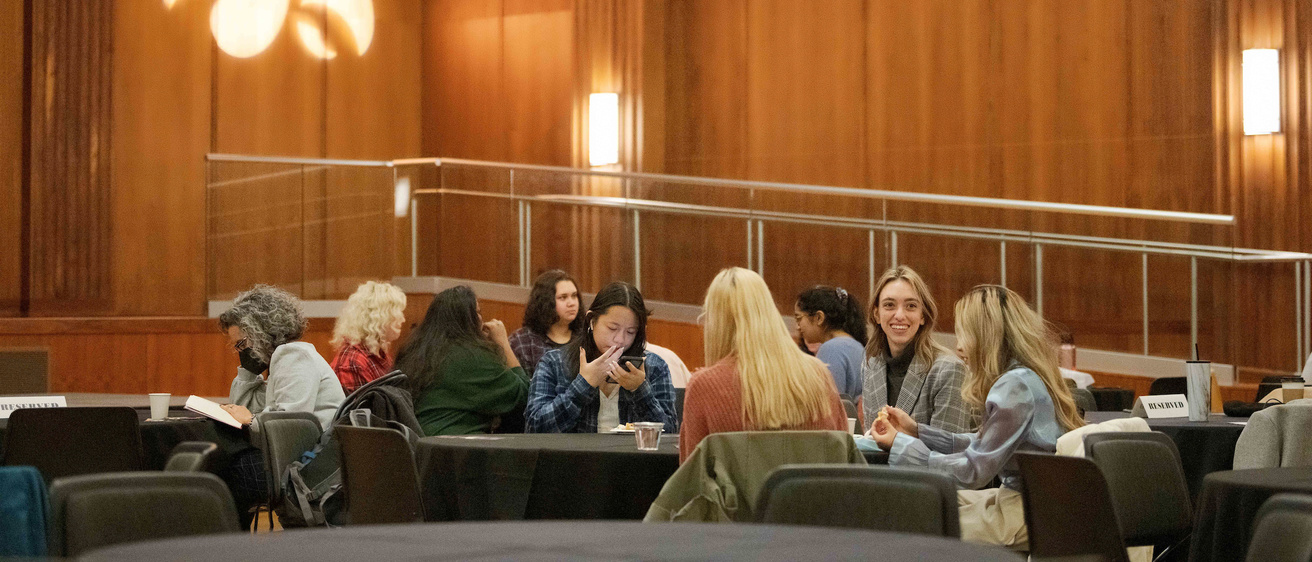 Students sitting at a table in the IMU Ballroom during the 1stGen Awards Ceremony